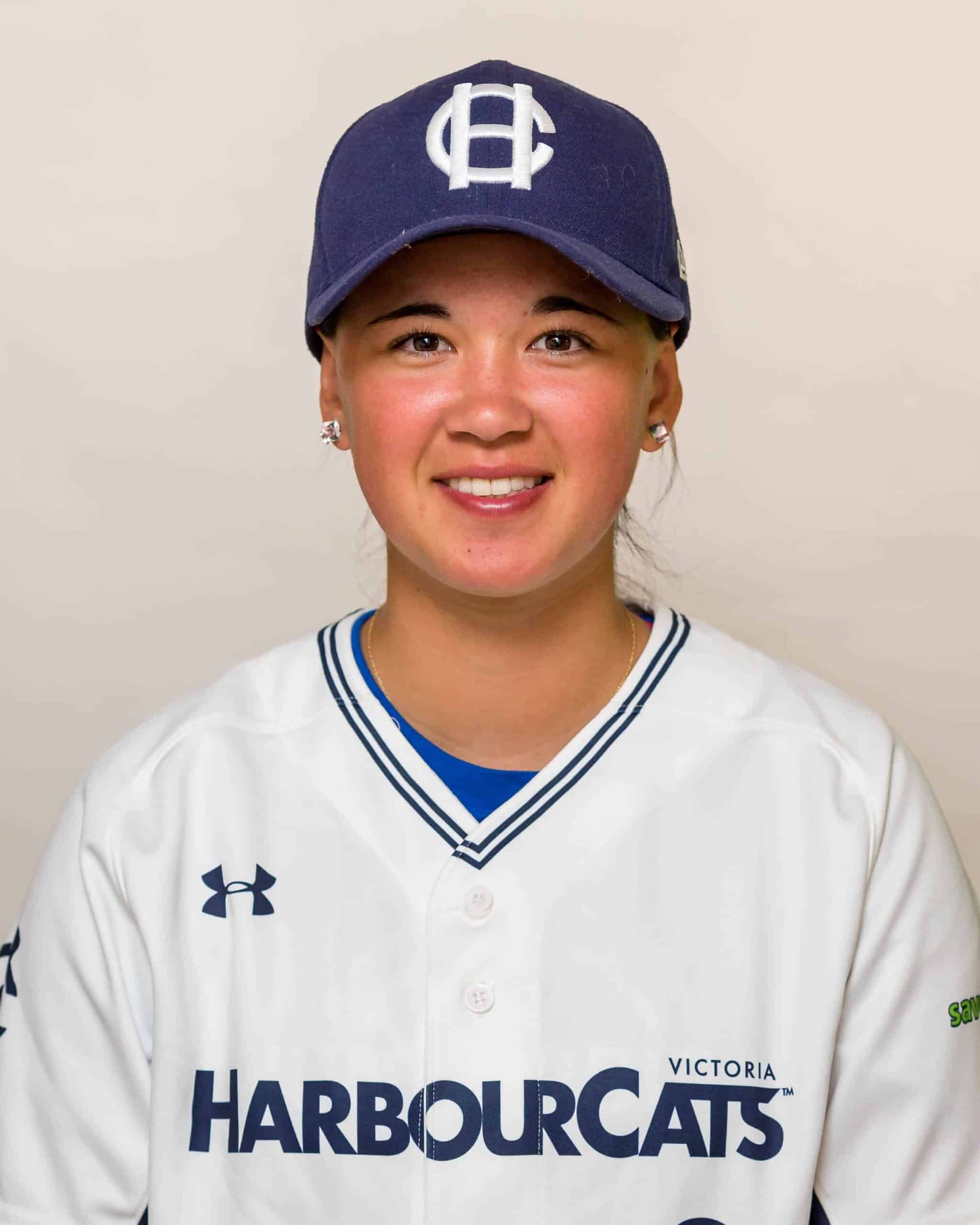 Claire Eccles, 19, pitches while posing for a photograph at the University  of British Columbia in Vancouver, B.C., on Friday May 12, 2017. The  Victoria HarbourCats announced Tuesday that Eccles will join